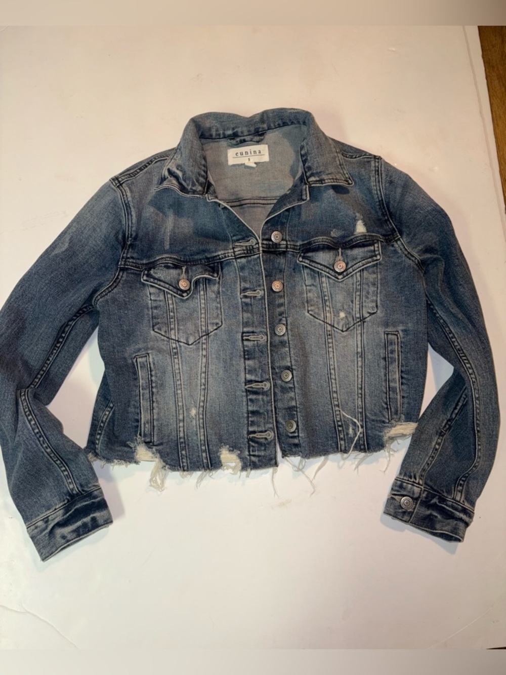 Eunina Women’s Distressed Style Denim Jacket Frayed Hem and Buttoned Cuffs Small